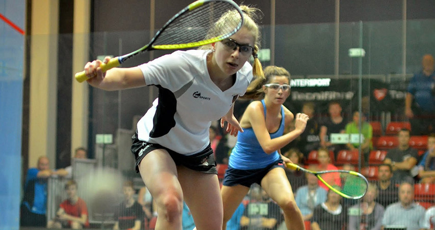 Female squash players on court