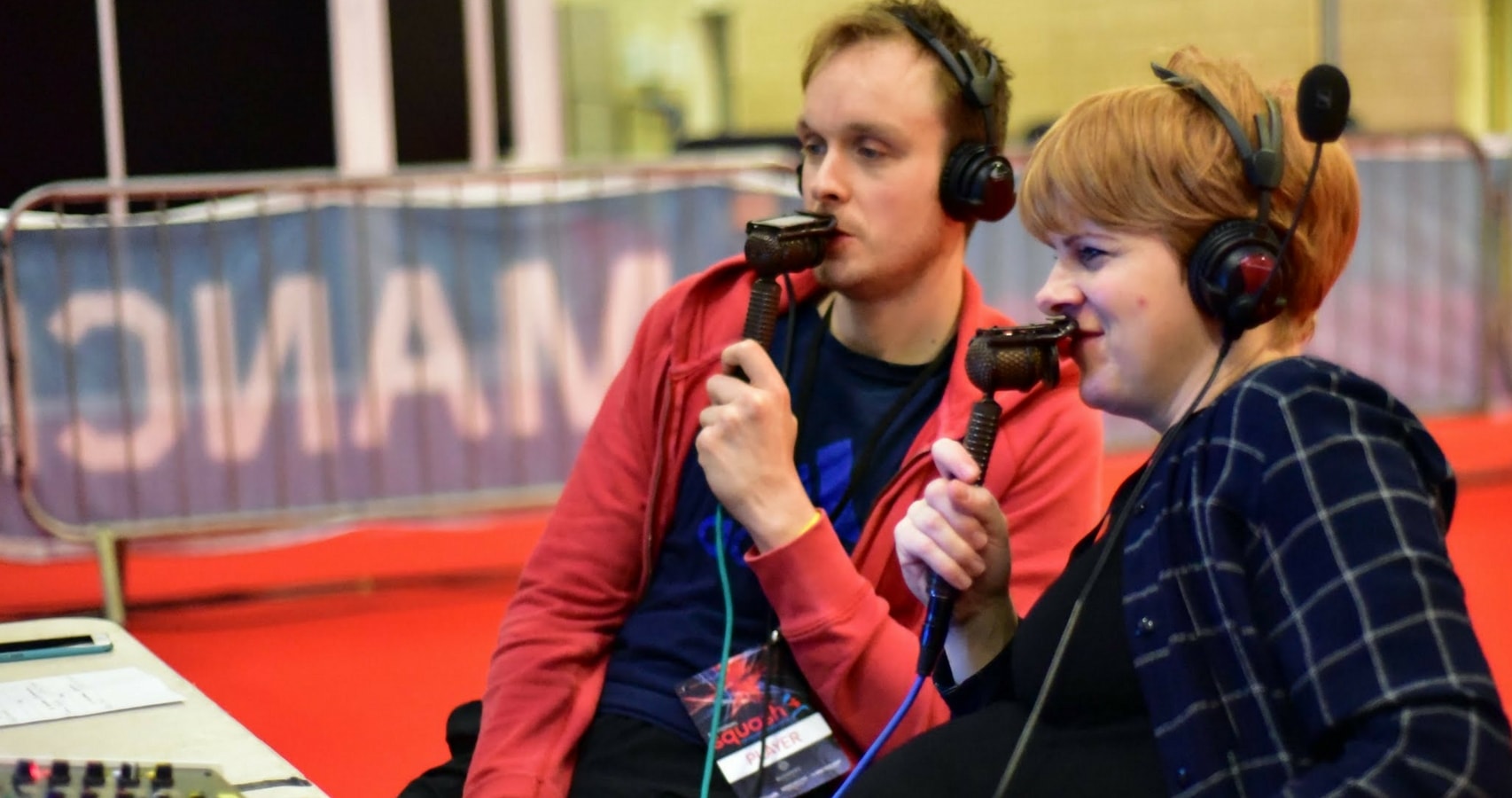 Vanessa Atkinson commentating at the National Squash Championships with her husband James Willstrop
