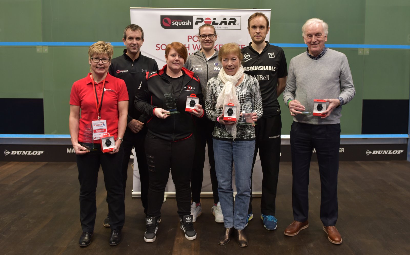 Group photo of the 2018 Polar Squash Workforce Award winners with the players who presented their prizes.