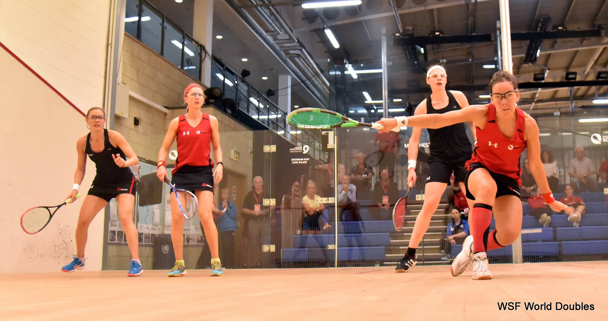 Laura Massaro, Alison Waters, Sarah-Jane Perry and Jenny Duncalf in action on the first day at the WSF World Doubles Squash Championships in Manchester