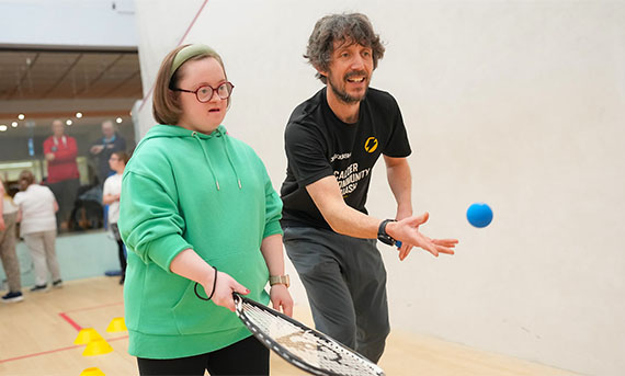 Young child with a male coach