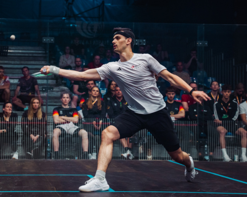 Curtis Malik hits a forehand