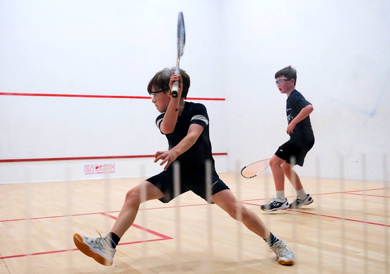 Two boys playing squash at the English Junior Championships 2024