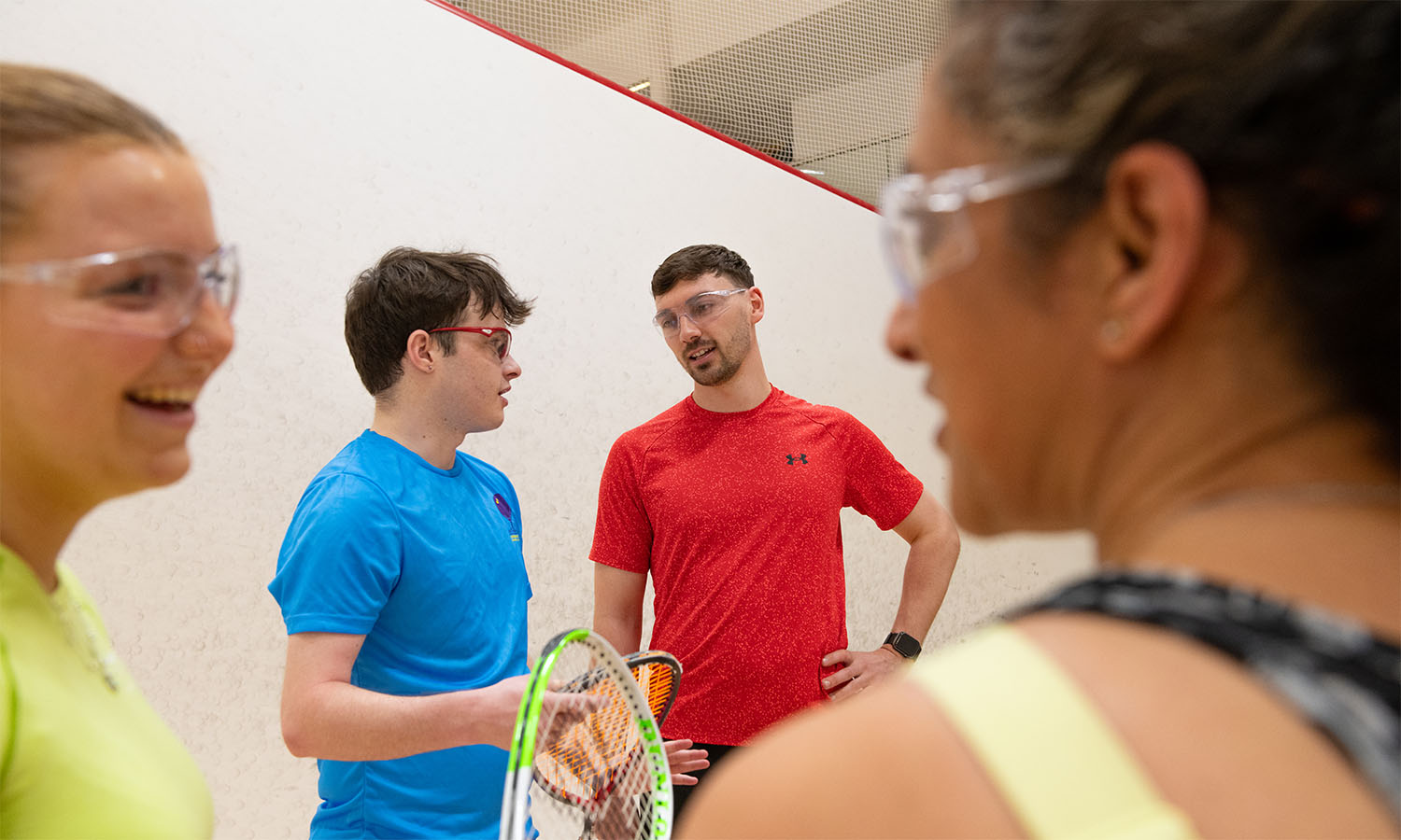 Players talking on a squash court