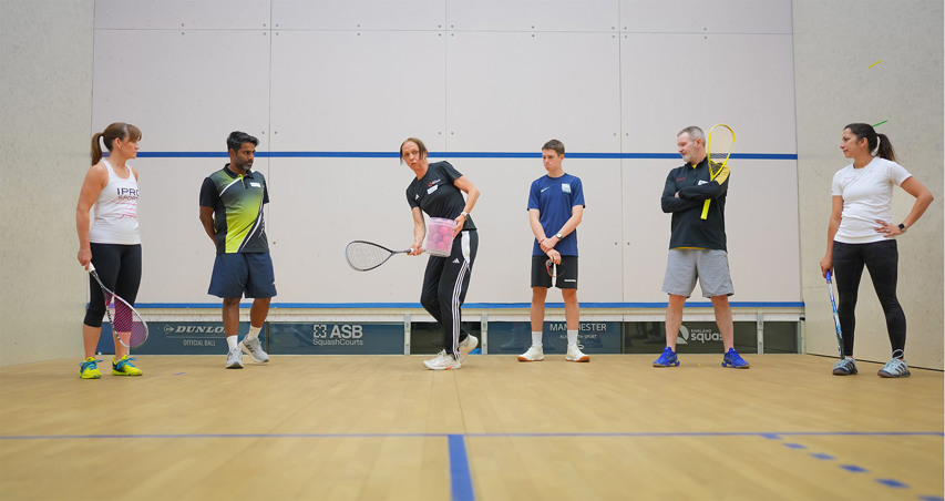 A squash coach leading an England Squash coaching course