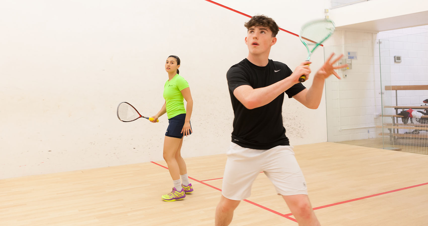 Female and male squash players